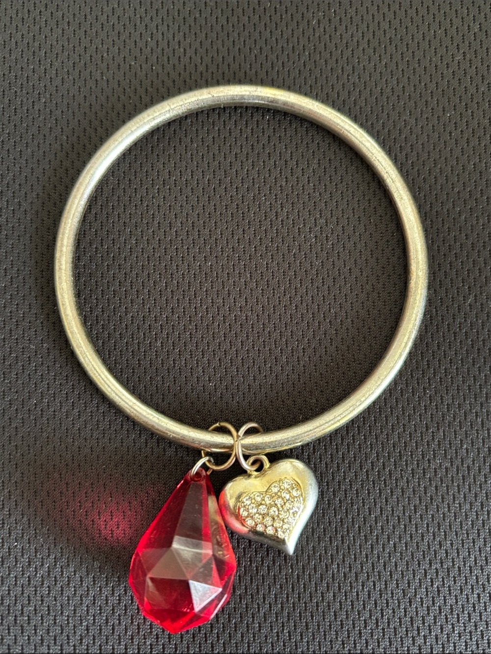 Silver-Tone Bangle Bracelet with Red Teardrop and Pave Heart Charm